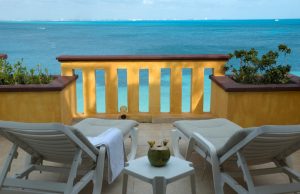 vacation rental hotel balcony with a view of the ocean